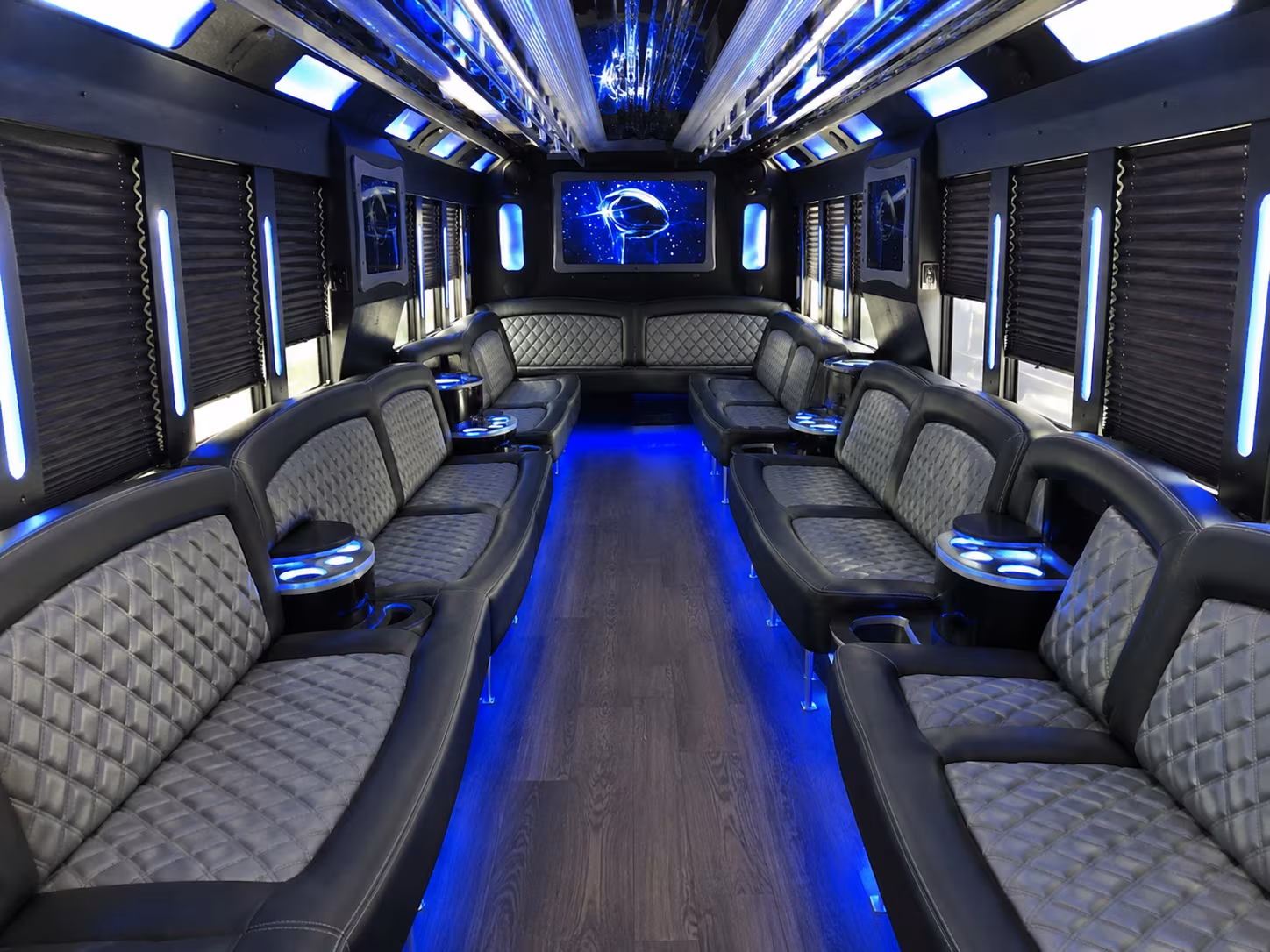 Friends laughing during a party bus celebration in Santa Rosa